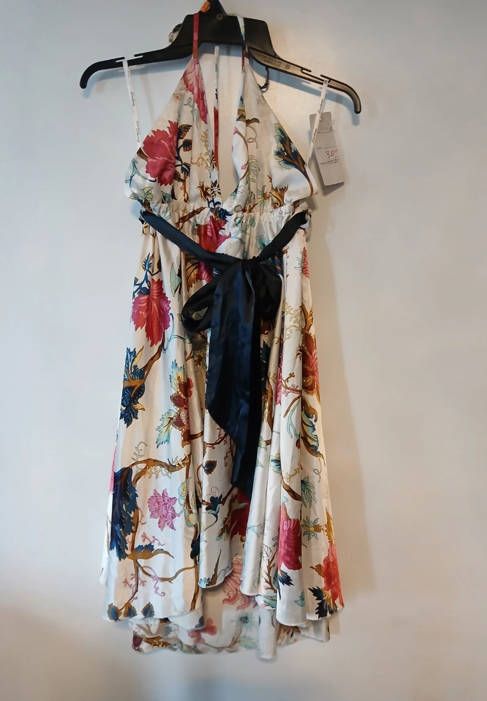 Striking floral halter neck dress with black waist tie.