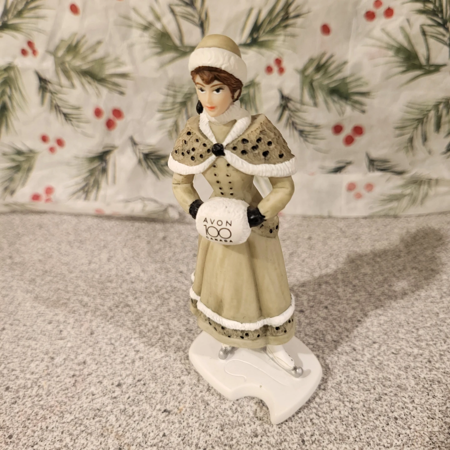 Avon miniature  Canada 100th Anniversary Skater Figurine