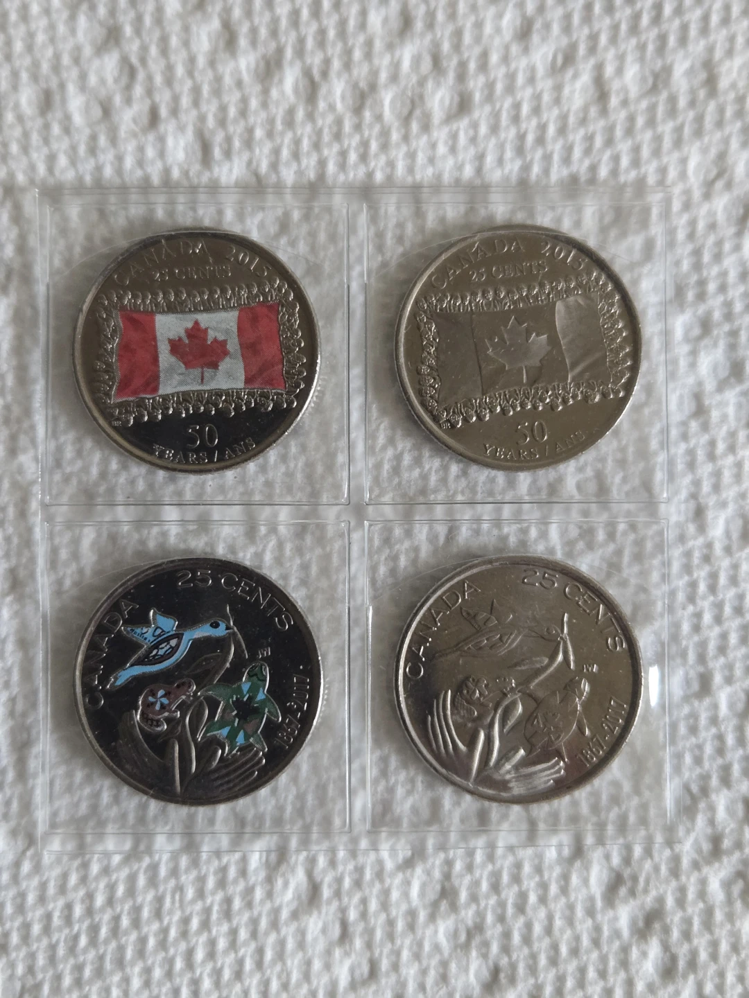 Collection of 4 Canadian 25 Cent Coins