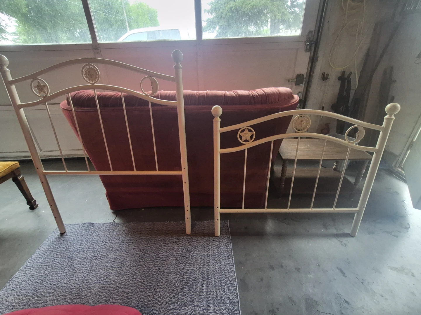 Metal Bed Frame with Sun, Star, and Moon Motifs