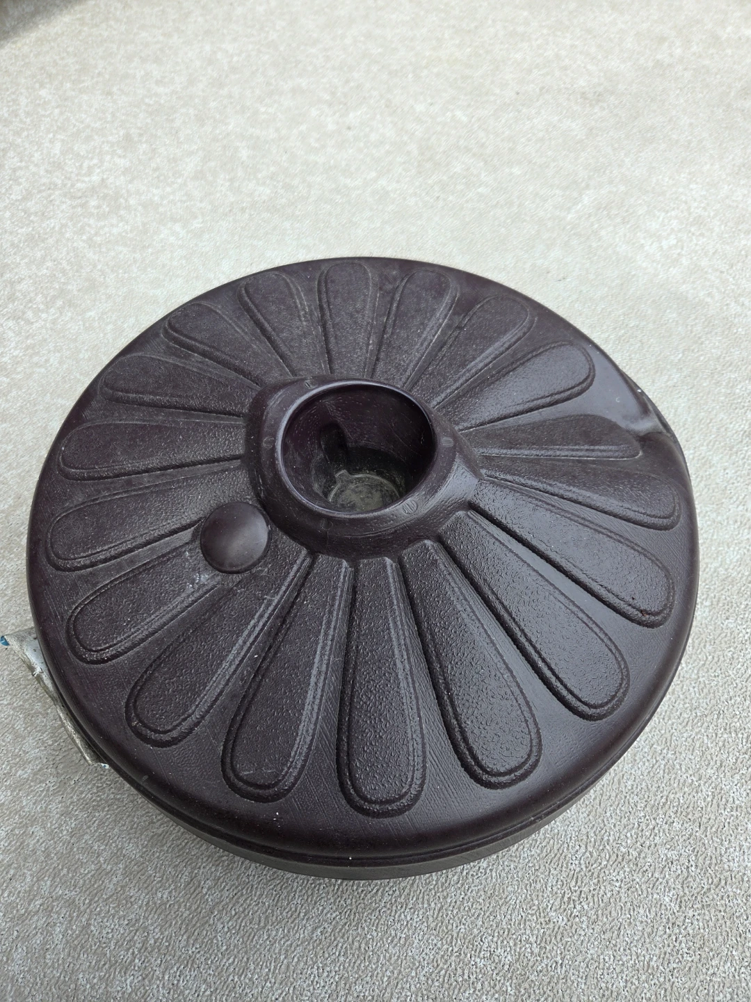 Umbrella Base Stand can be filled with water or sand