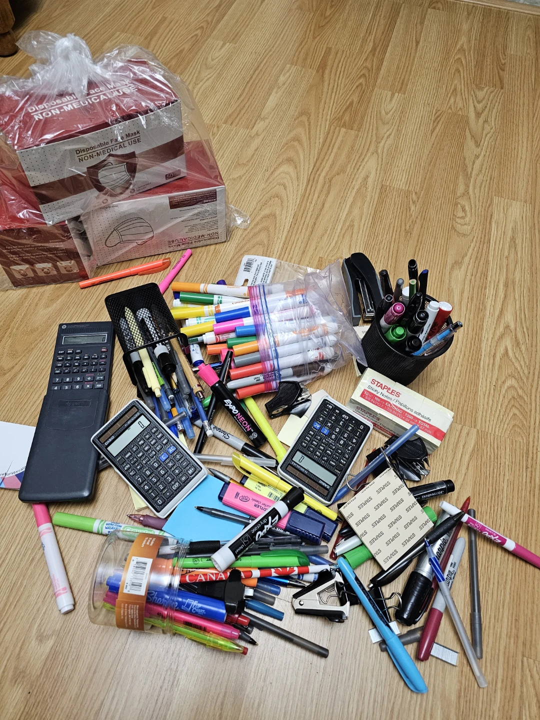 A selection of stationery, calculators, staplers,