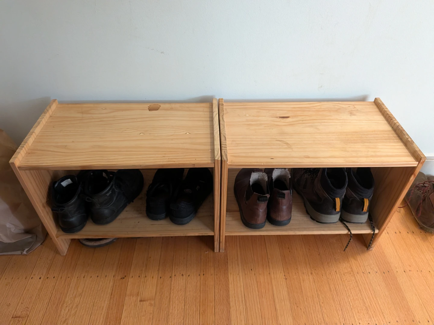Two solid wood storage units