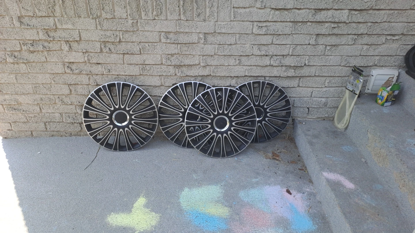 Set of 4 Black and Silver Hubcaps - wheel covers