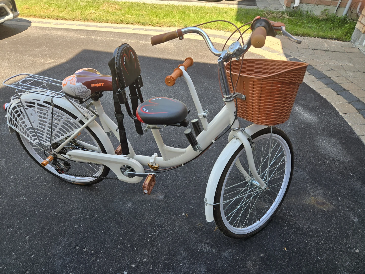 Retro white tandem cruiser with basket