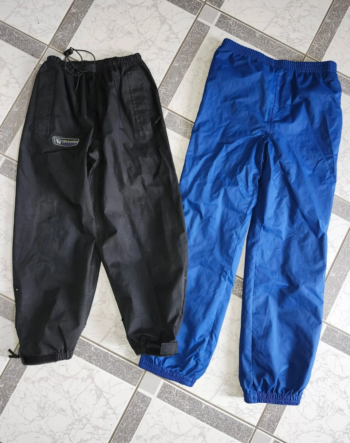 2 pairs of kids size 10/12 Large splash pants.