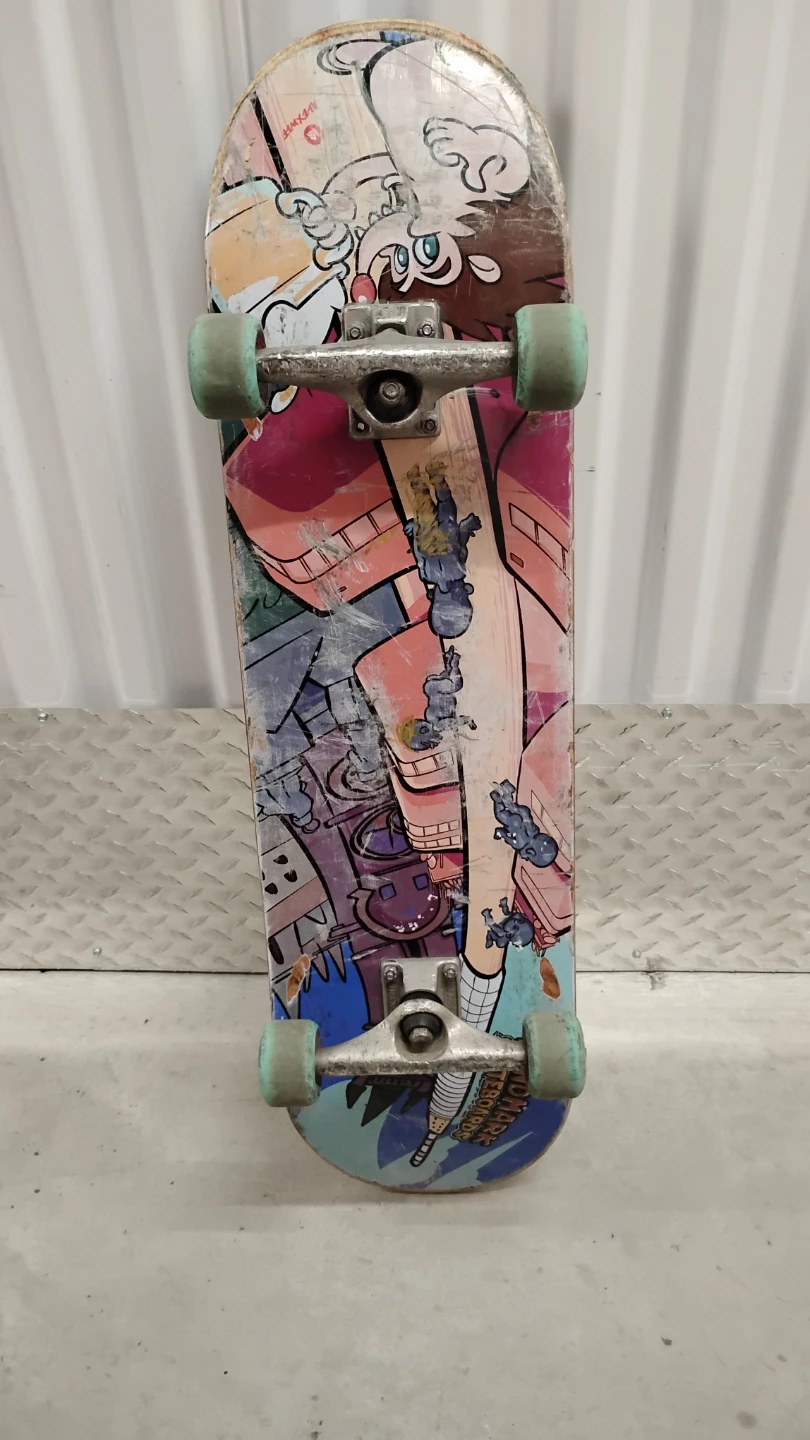 Used Skateboard with Fun Graphics
