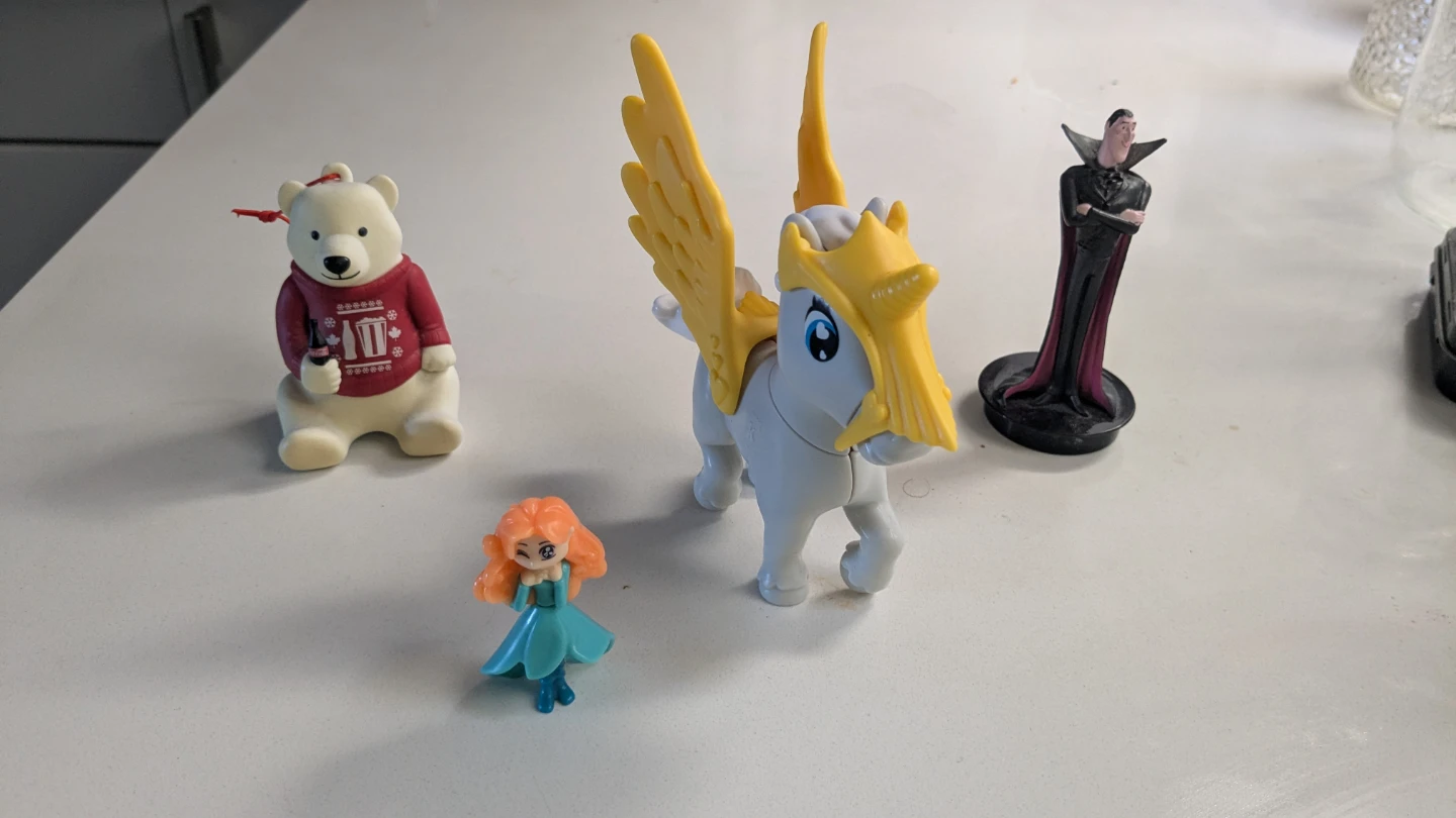 Assorted small toy figurines set - photo 2