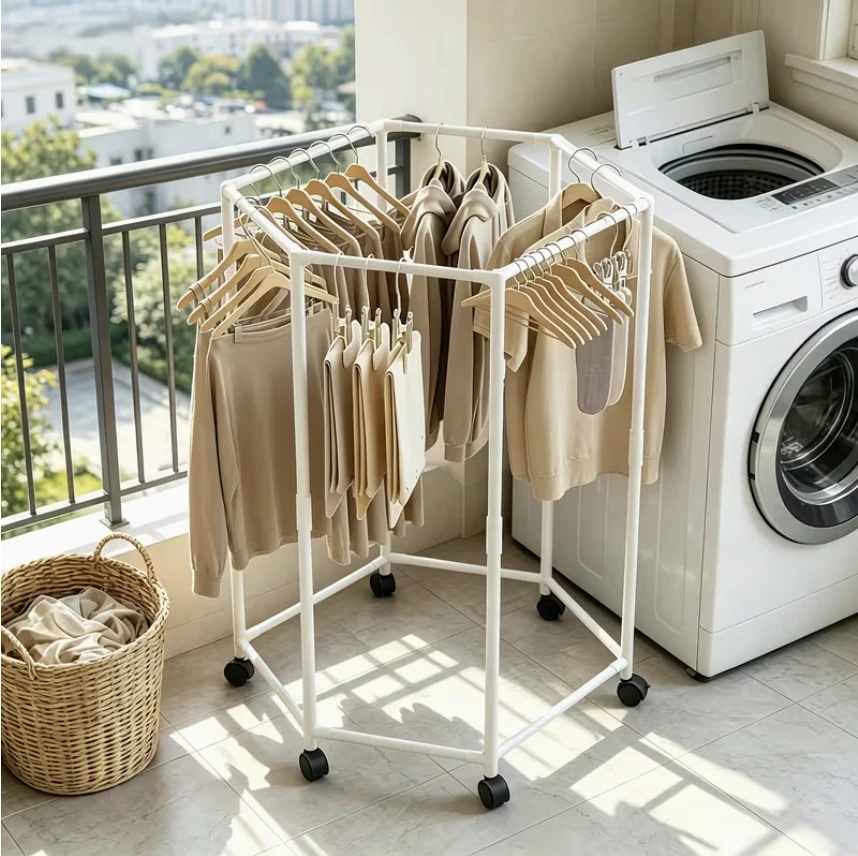 White hexagonal clothes drying rack with rotating wheels