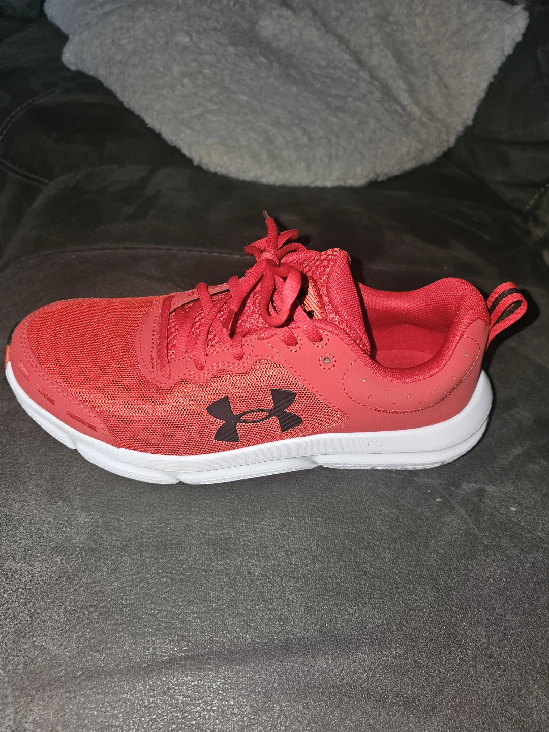 Red Under Armour running shoes