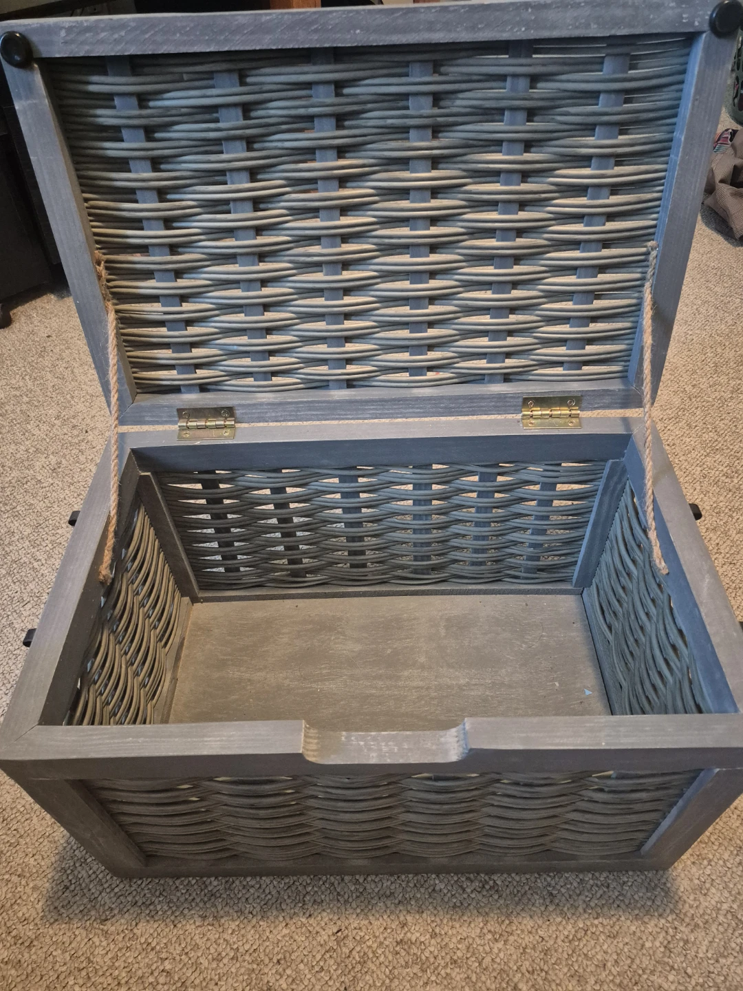Grey wooden and wicker storage chest with lid