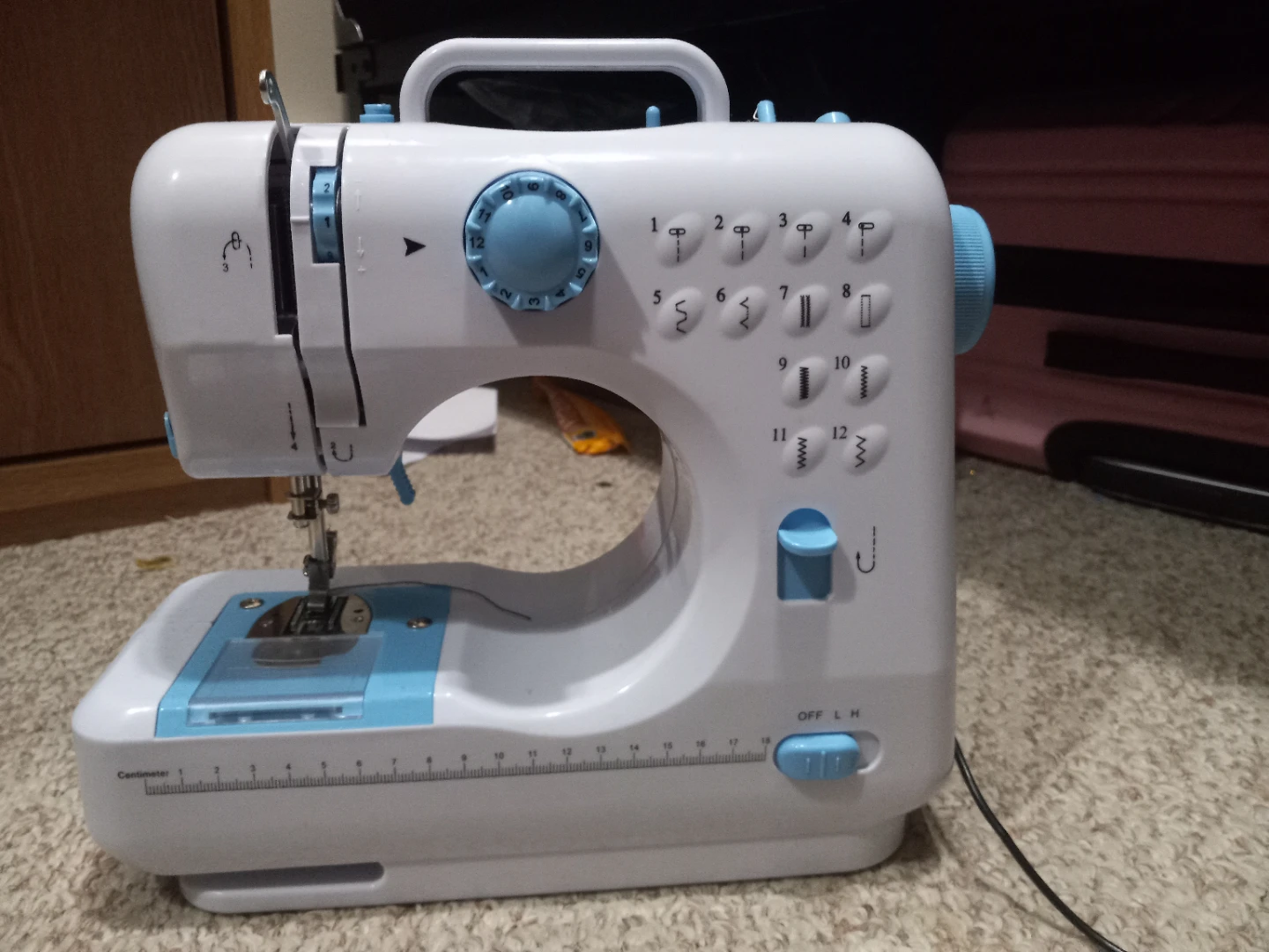 White and Blue Sewing Machine