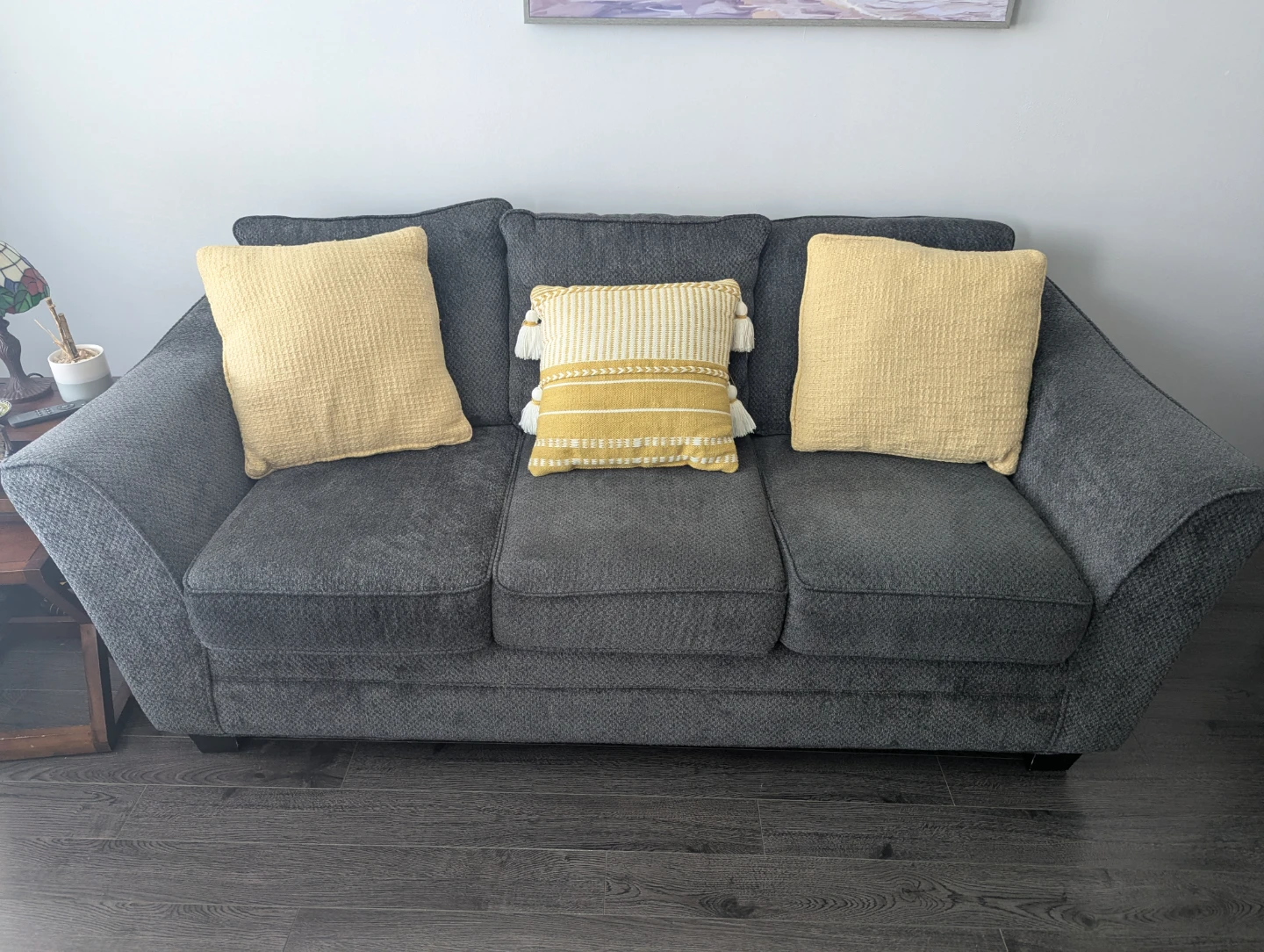 Dark Grey Sofa with Yellow Accent Pillows