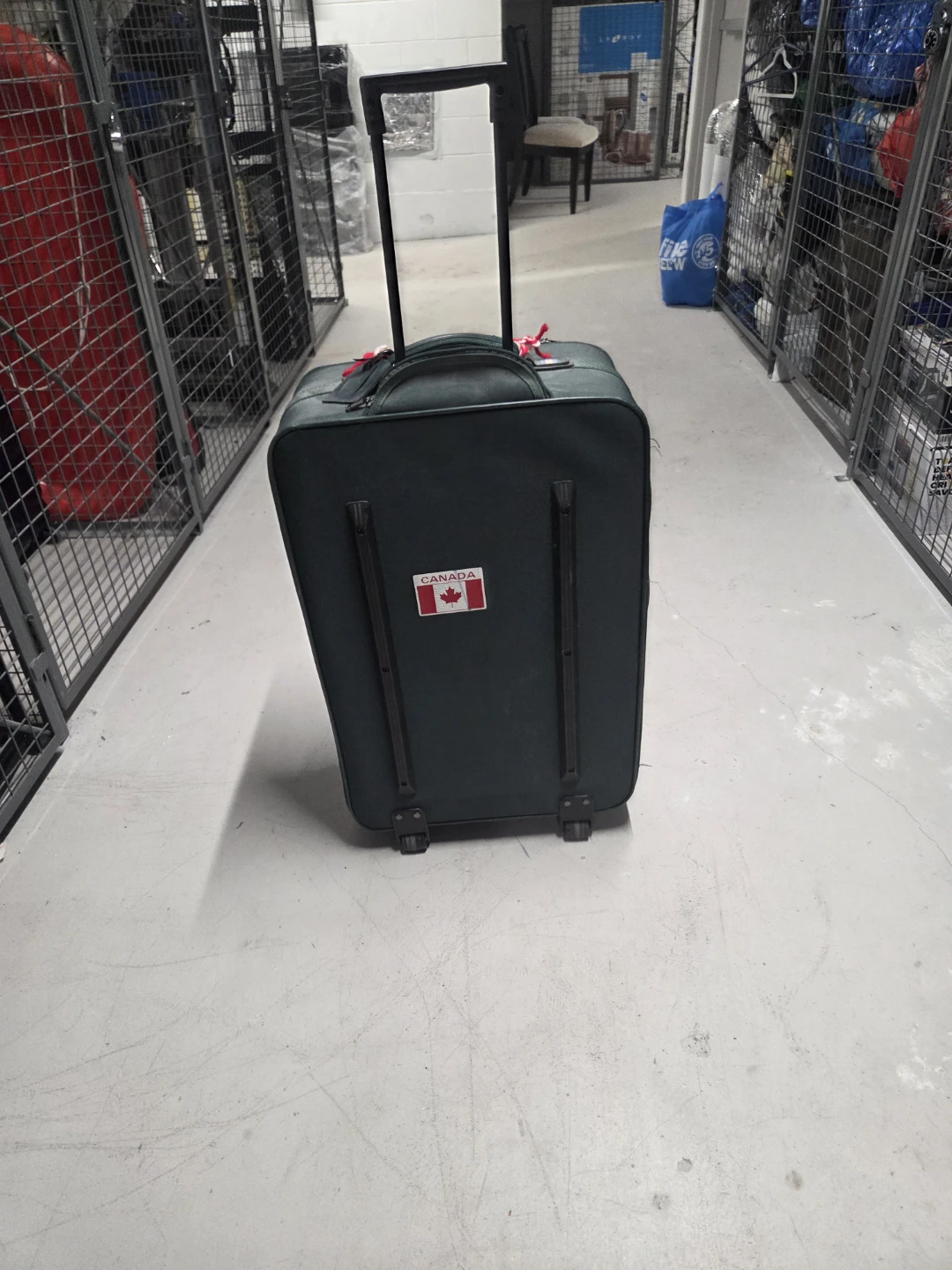Jaguar Dark Green Spinner Suitcase with Canadian Flag Decal - photo 3