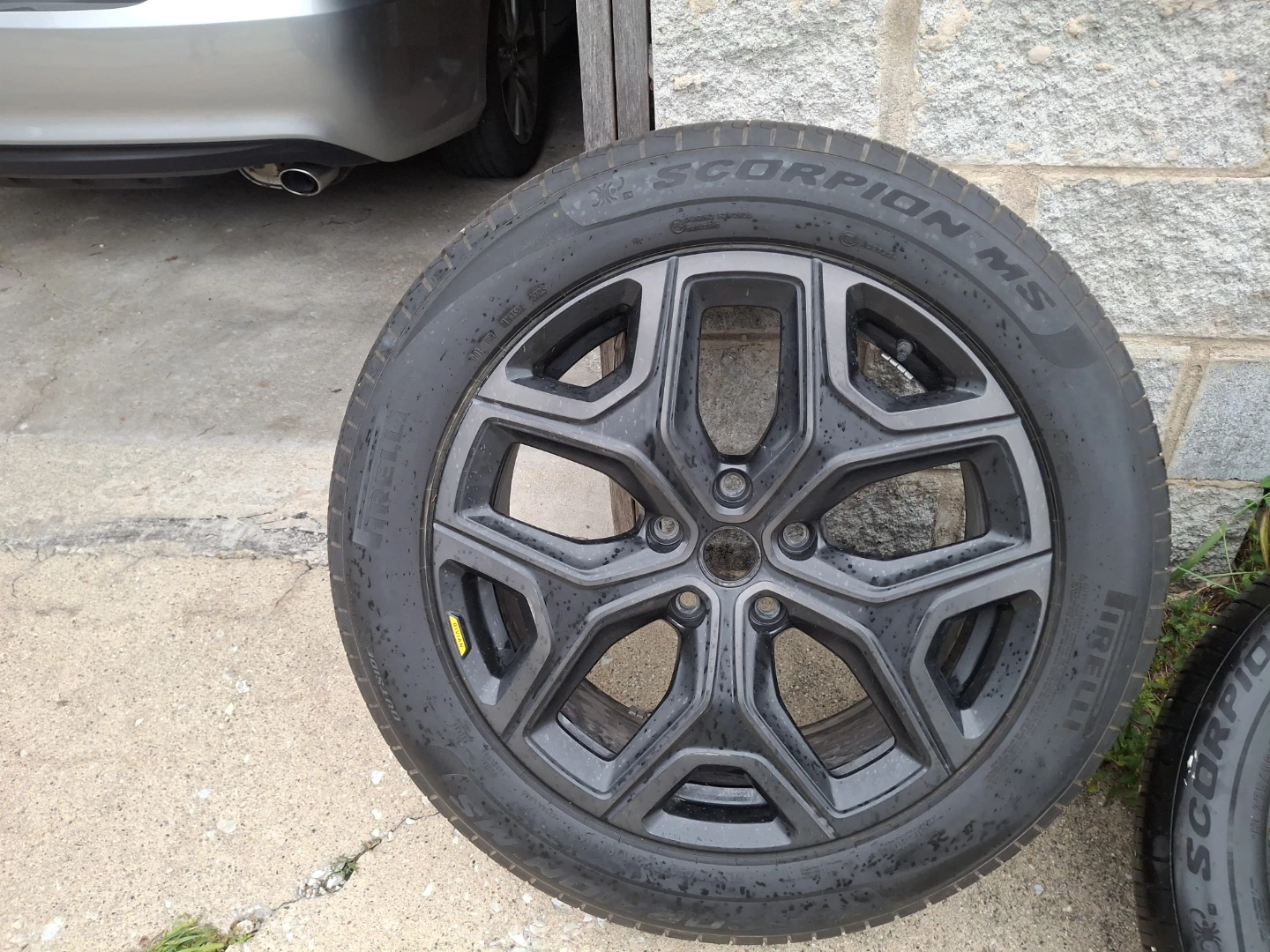 Rivian  wheel  and two tires