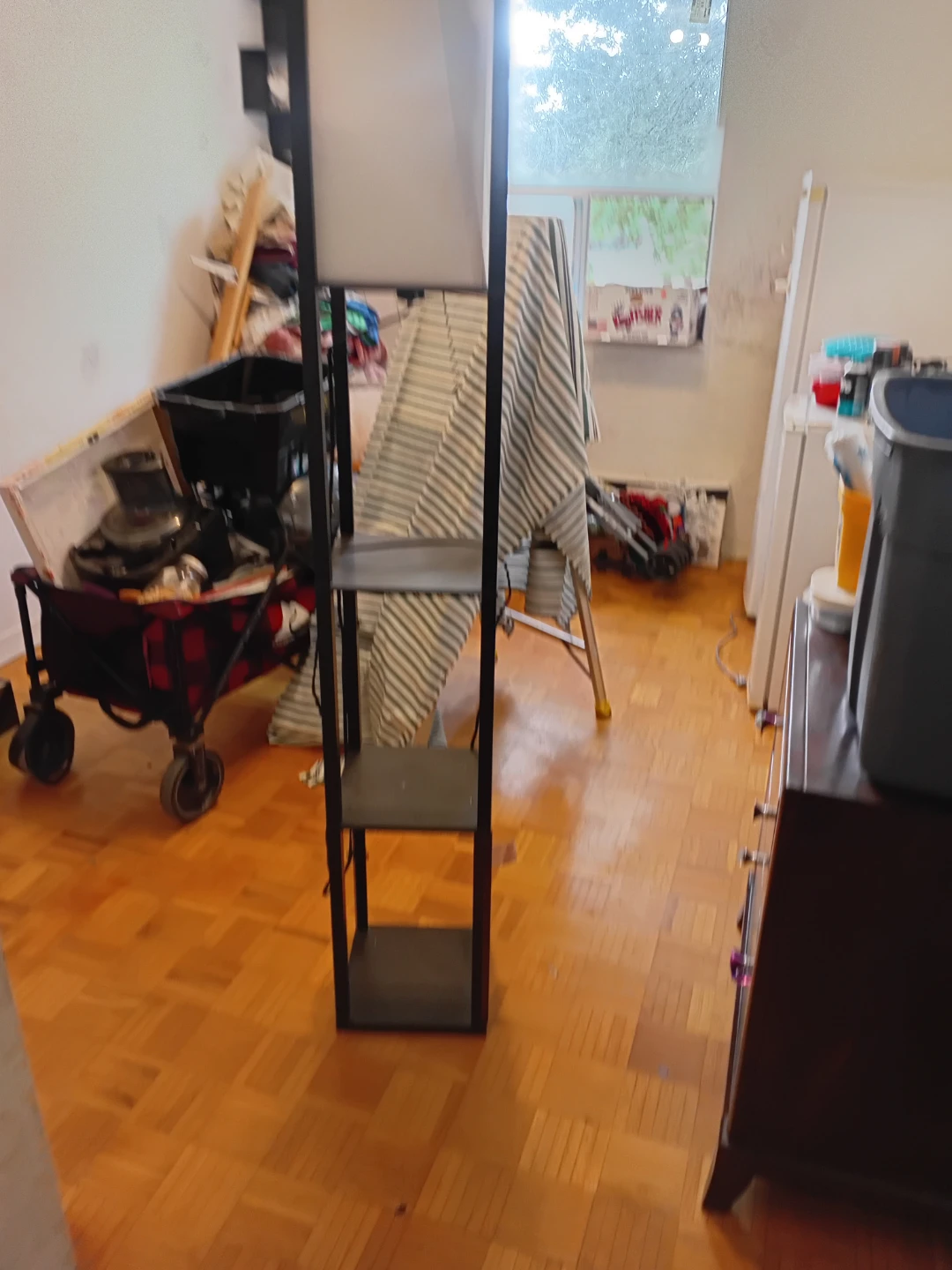 Black floor lamp with shelves