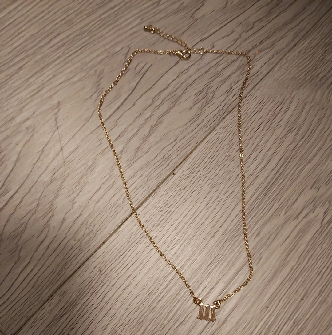 Gold Gemini zodiac sign necklace