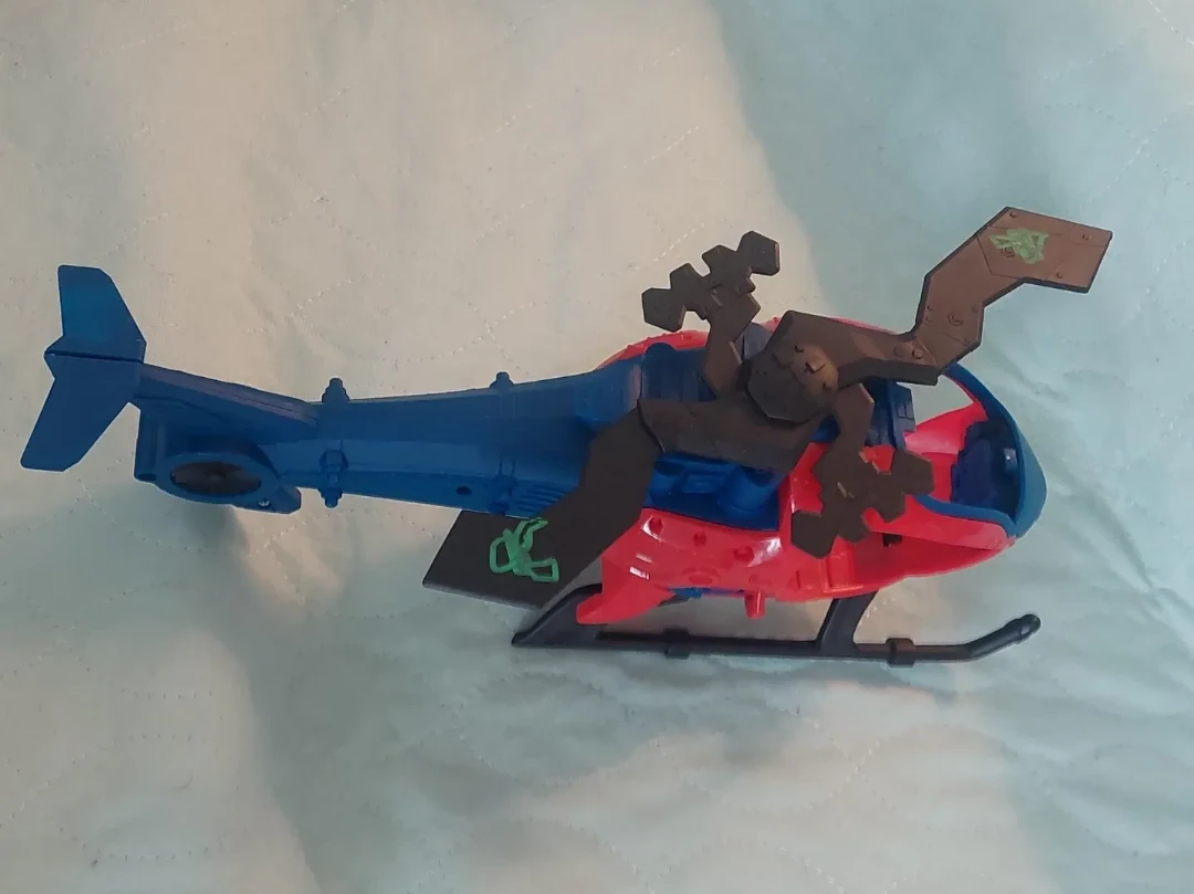 Blue and Red Toy Helicopter