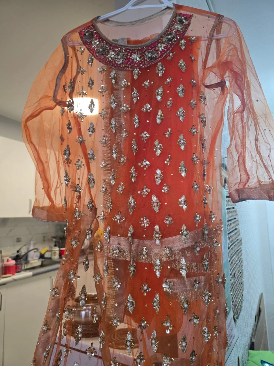 Embellished Orange Kurti with Pink Sharara Pants