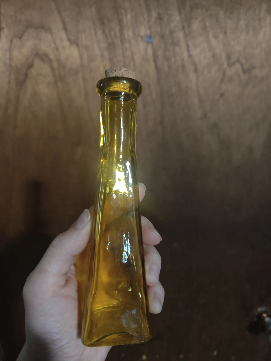 Amber glass bottle with cork stopper