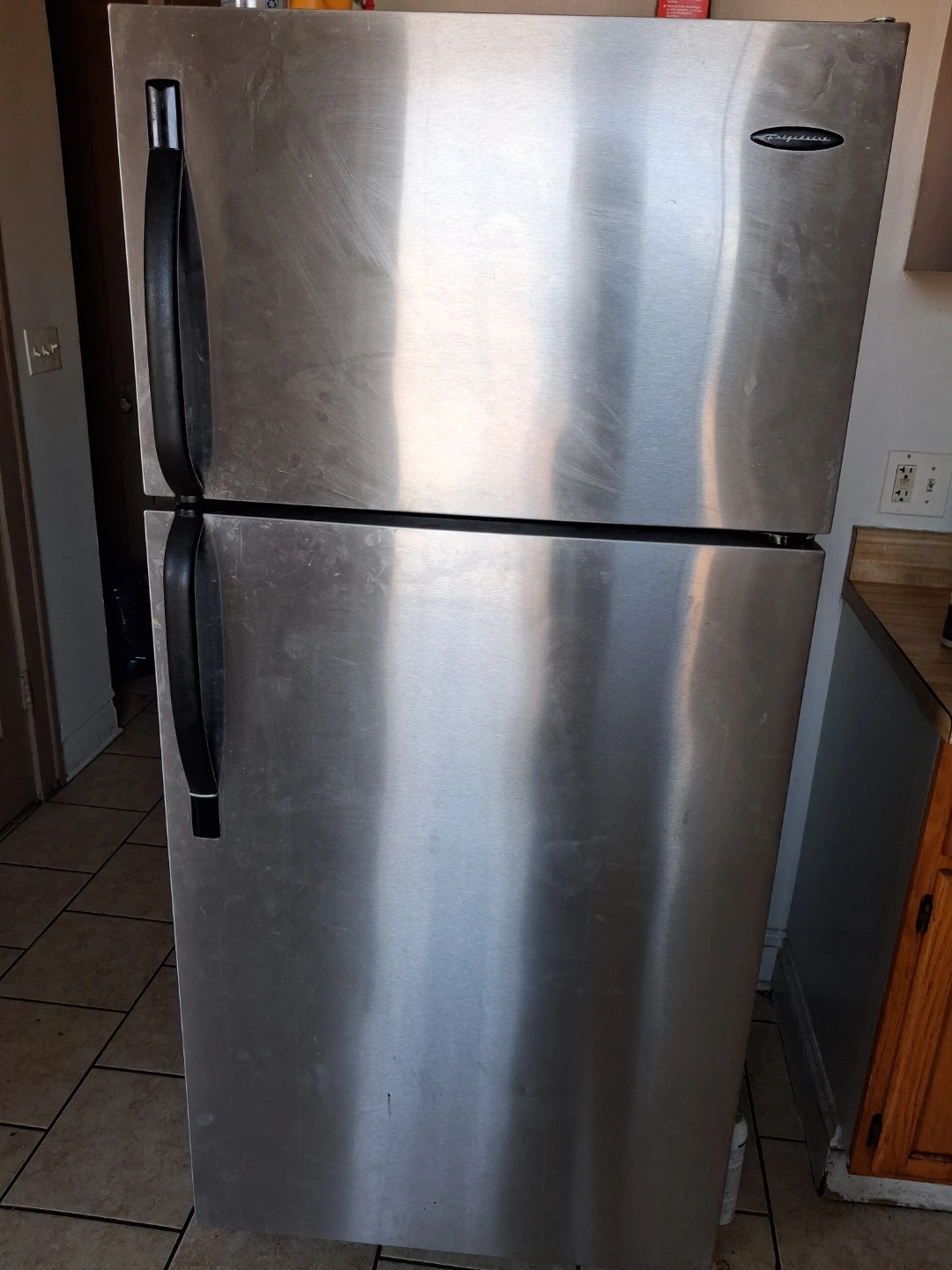 Frigidaire Stainless Steel Refrigerator and Gas Range - photo 2