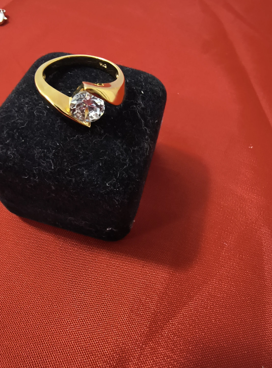 Gold-toned bypass ring with clear stone