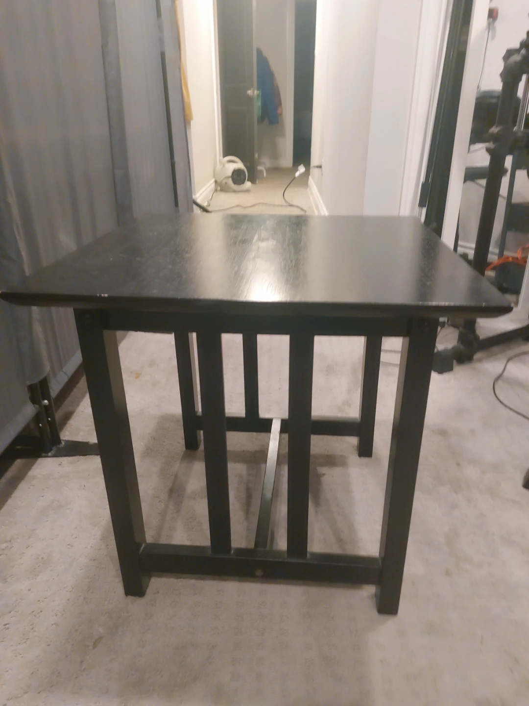 Black square wooden side table