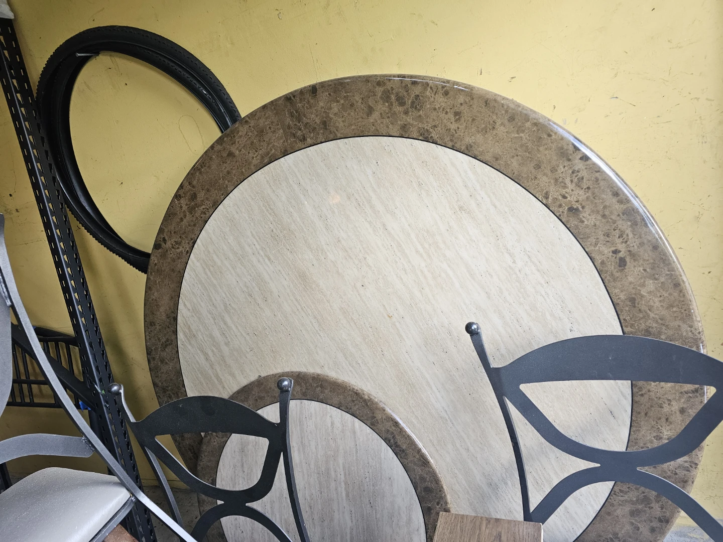 Round marble dining table with base and chairs