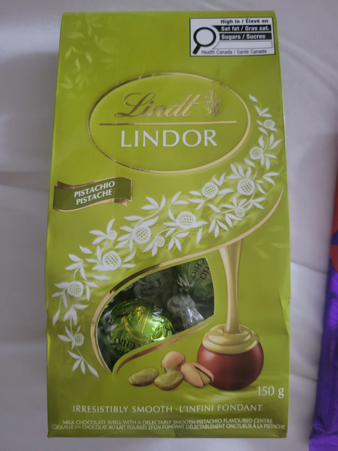 Lindt Lindor Pistachio Milk Chocolate Truffles Bag - photo 2