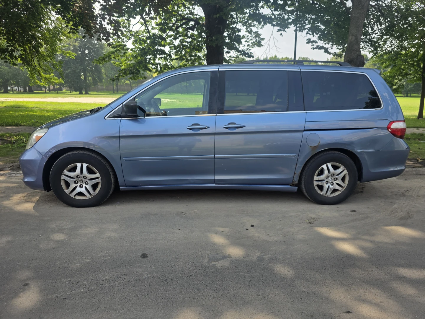 Blue Honda Odyssey Minivan