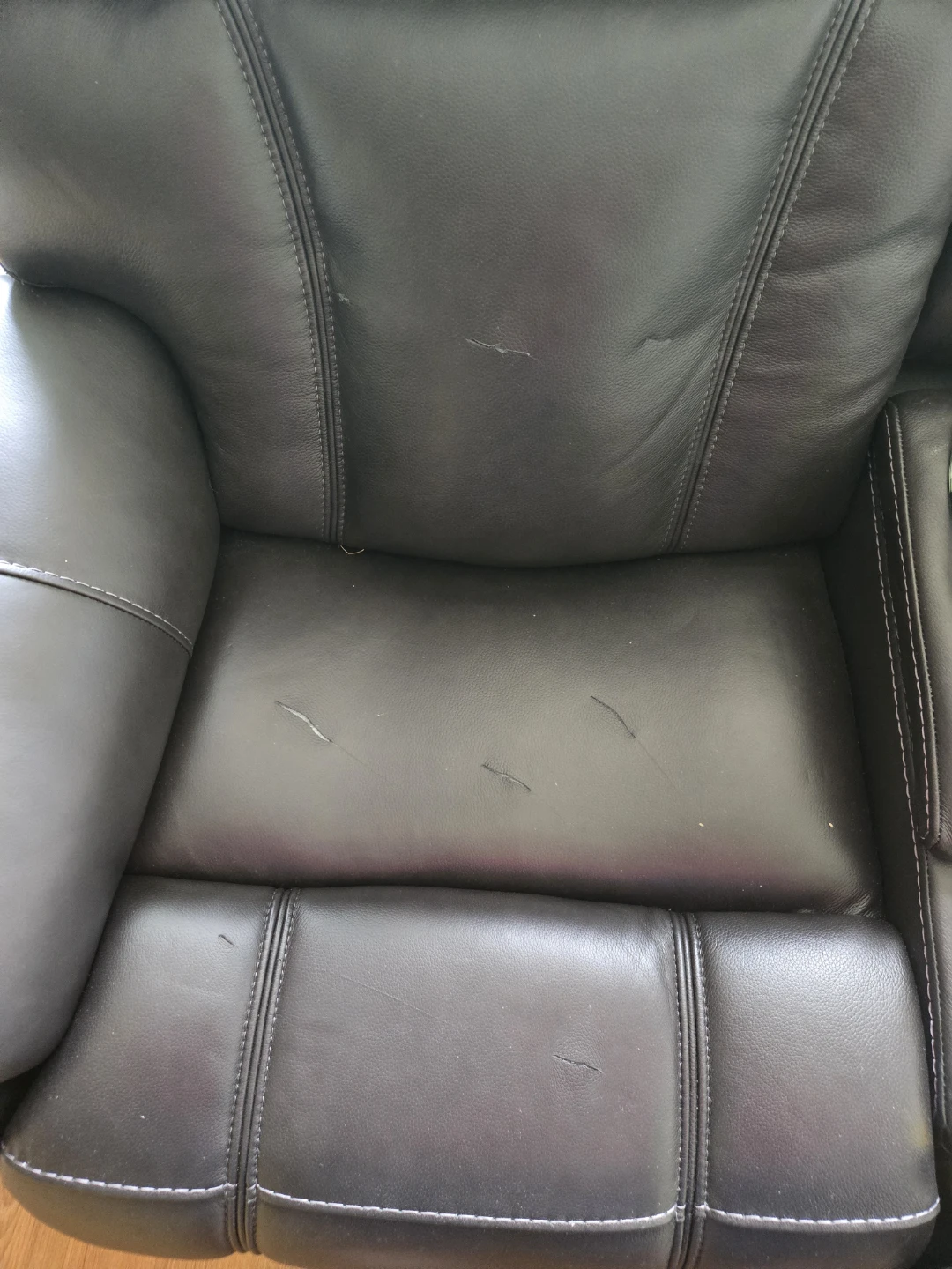 Black faux leather Loveseat.  Some tears, no powercord. - photo 5