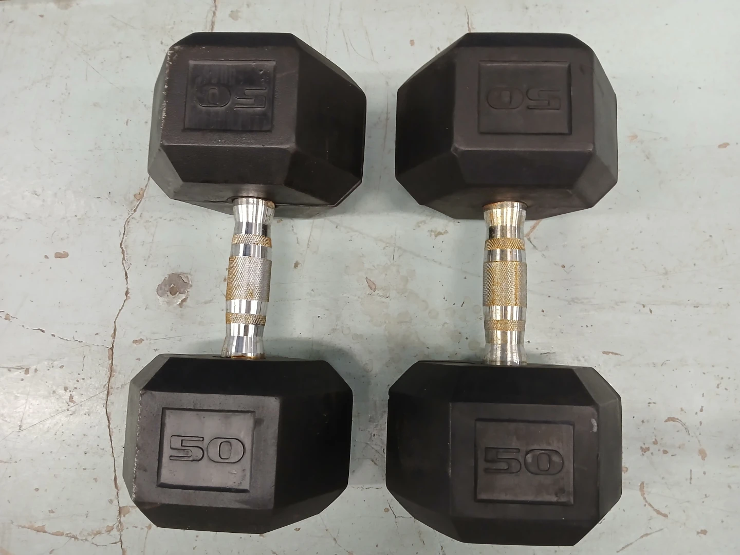 Two 50 lb Hex Dumbbells