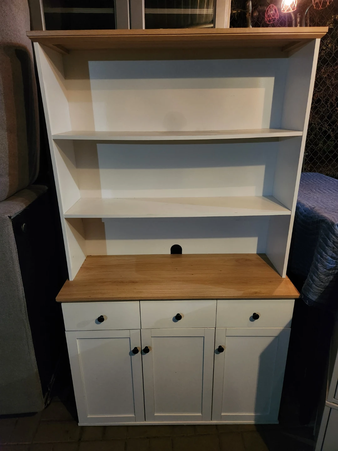 White and wood hutch with drawers and cabinets