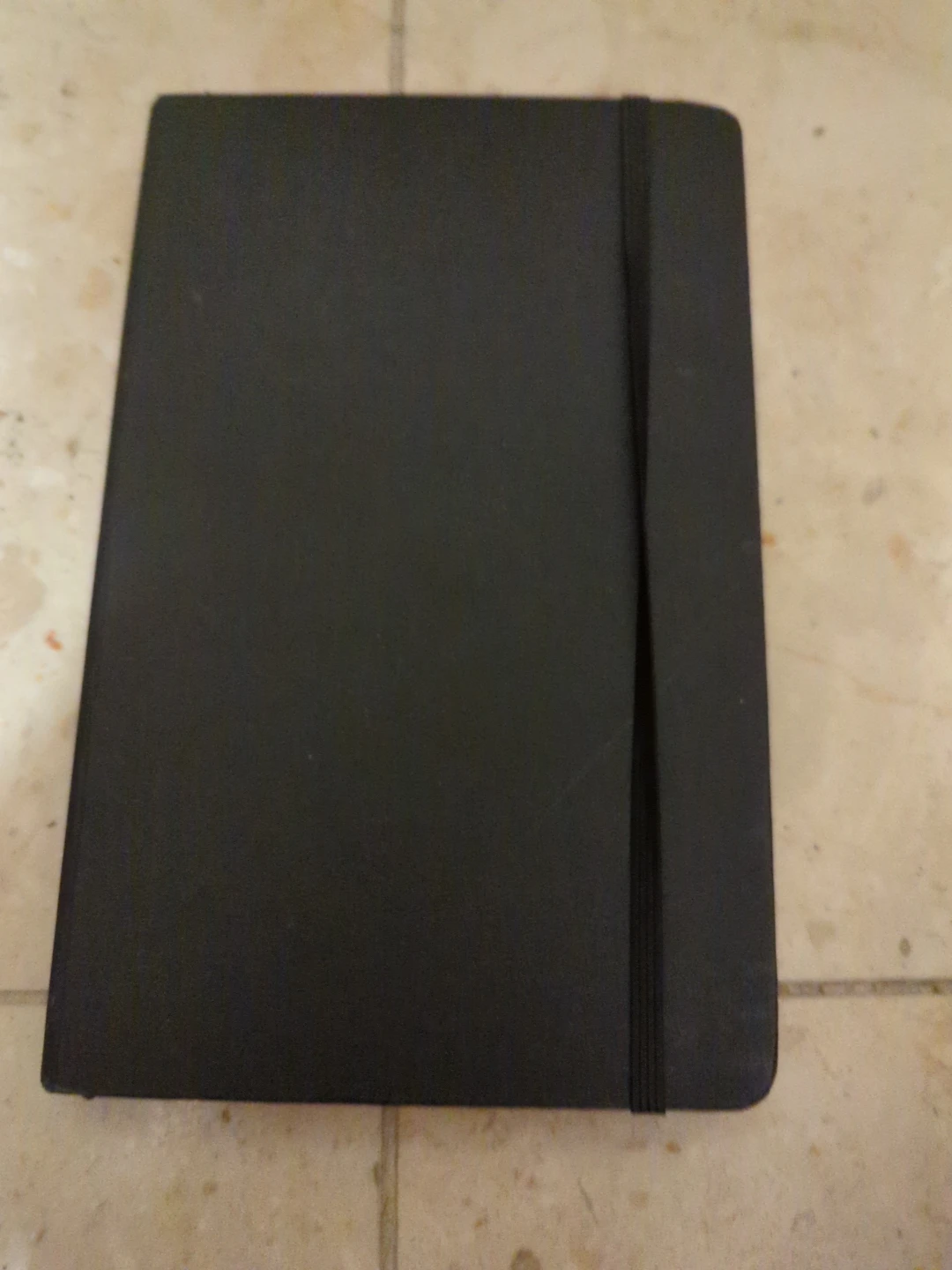 Black Notebook with Grid Pages