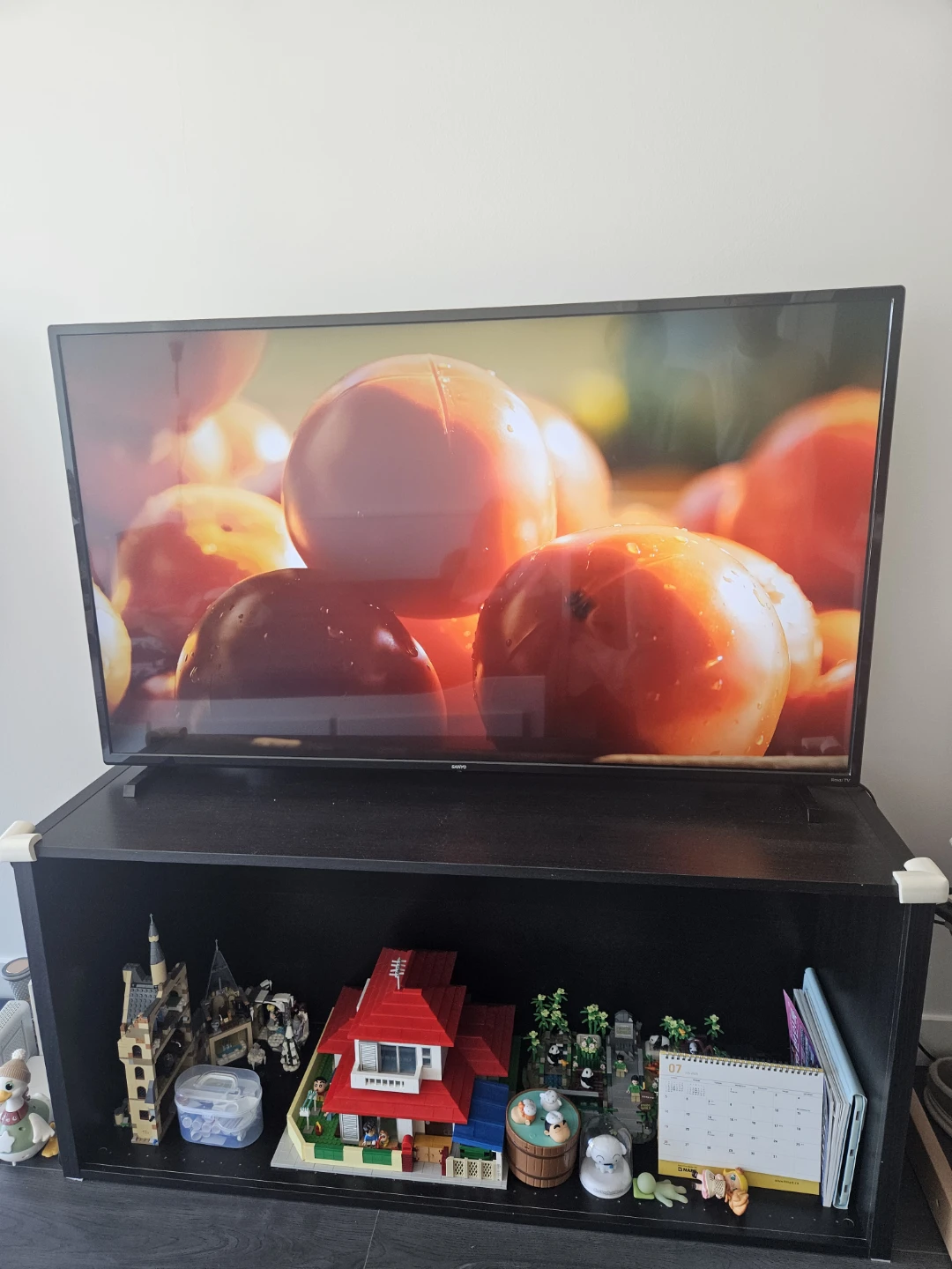 55" Sanyo Roku Smart TV and TV stand as a set - photo 2