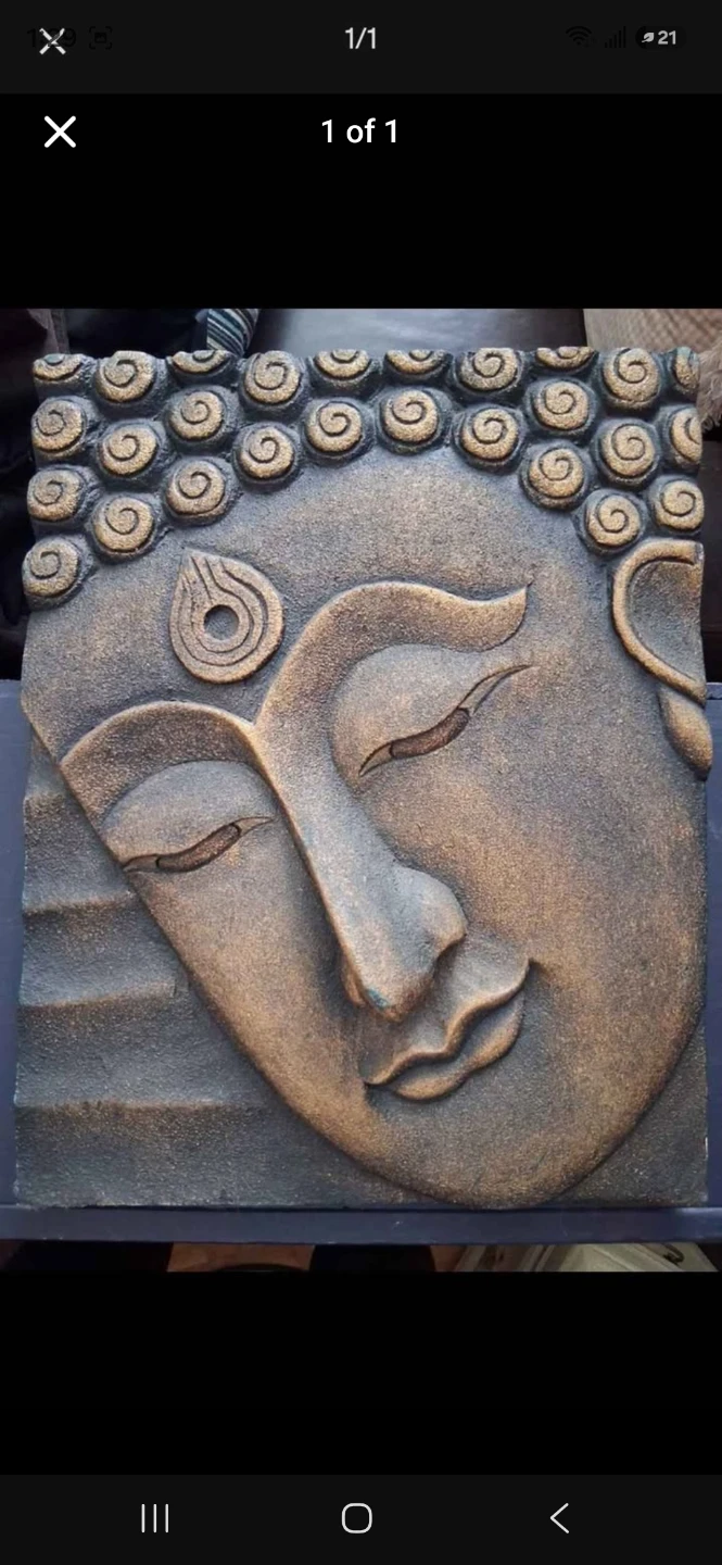 Beautiful Buddhist art, heavy, solid Buddha portrait.