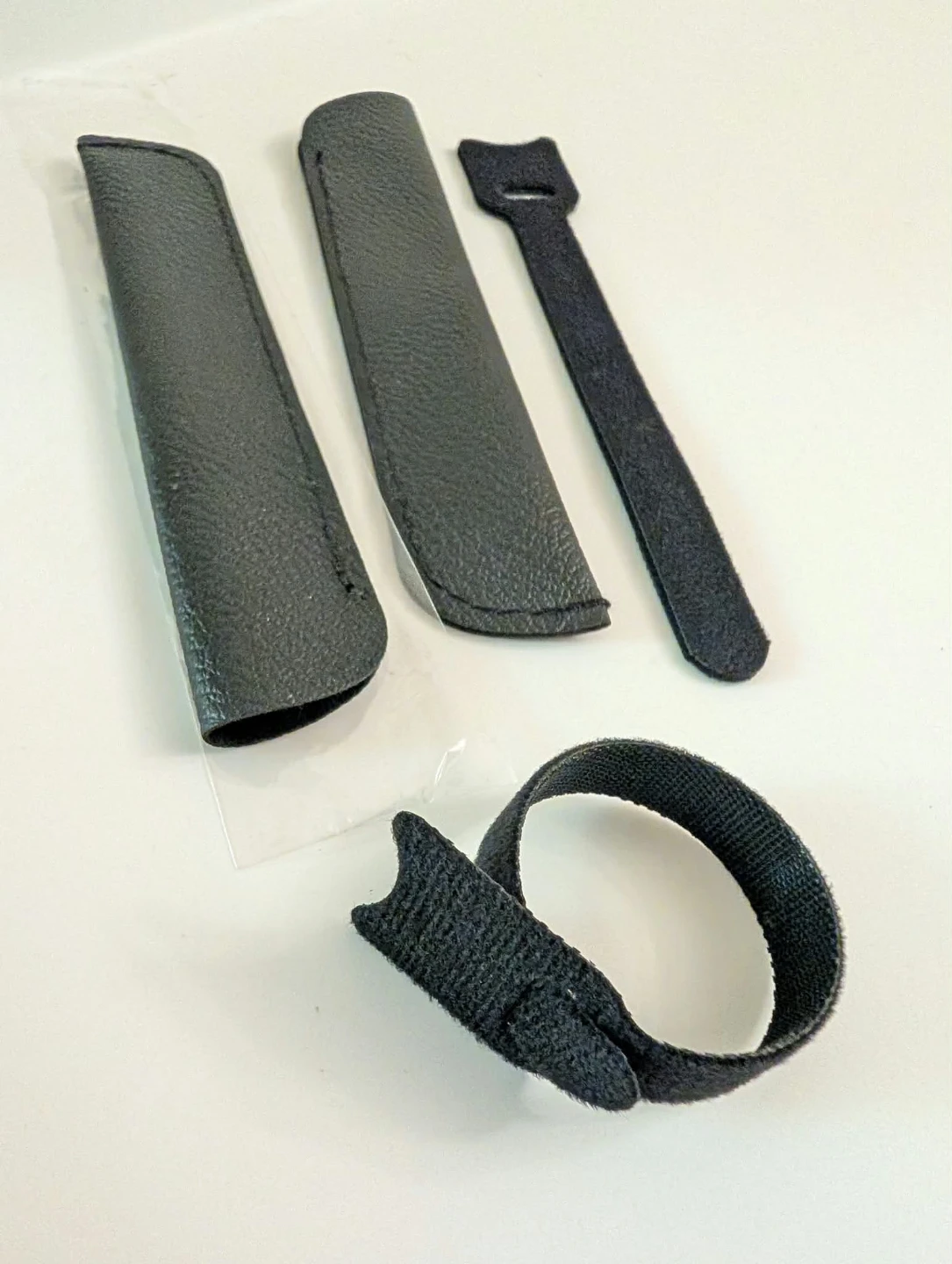 Black stylus pouches and cable organizers - photo 3