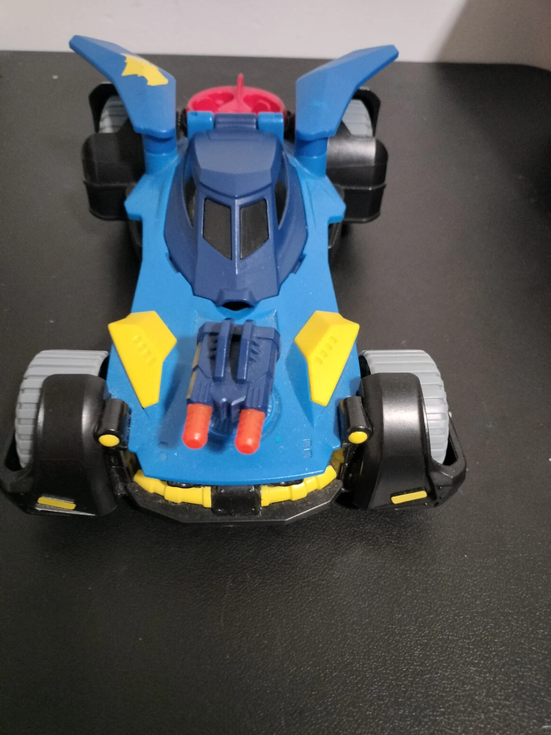 Blue and Yellow Toy Batmobile