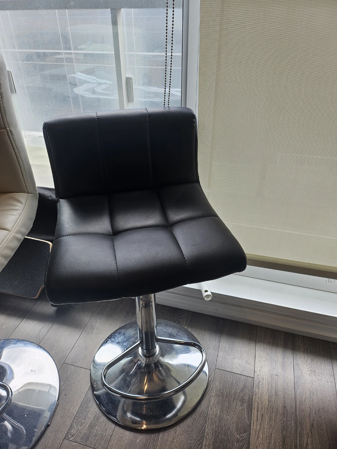 Black adjustable bar stool