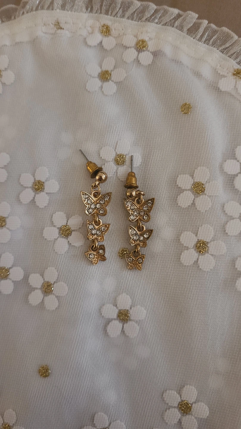 Gold butterfly dangle earrings with rhinestones