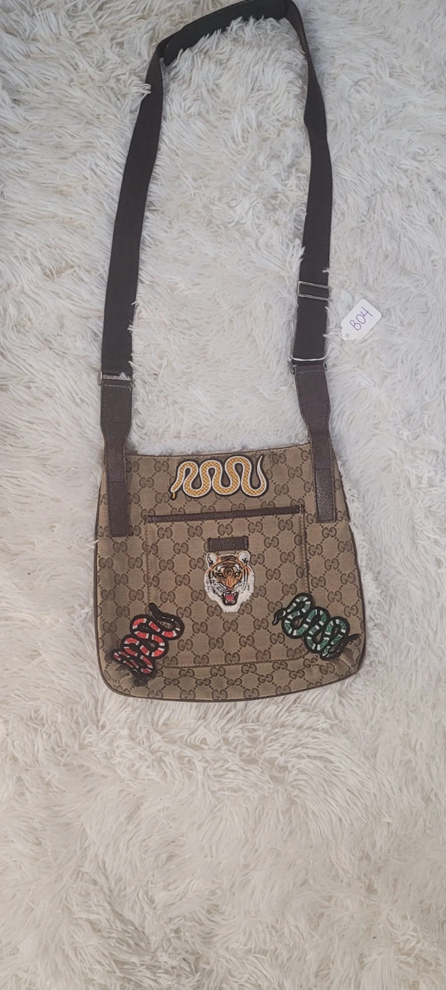 Gucci supreme logo crossbody bag