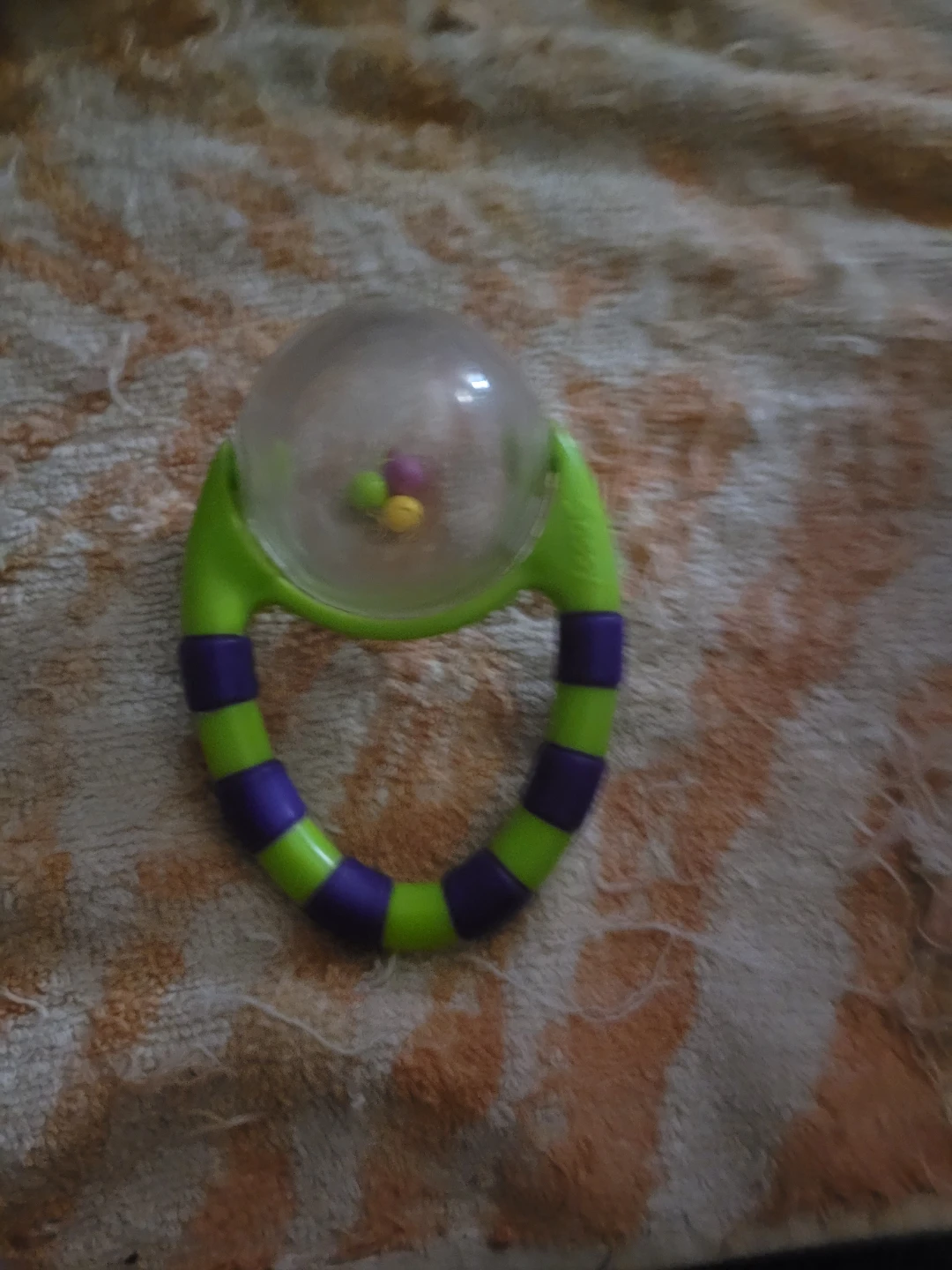 Sassy Flip & Grip Rattle, which features high-contrast