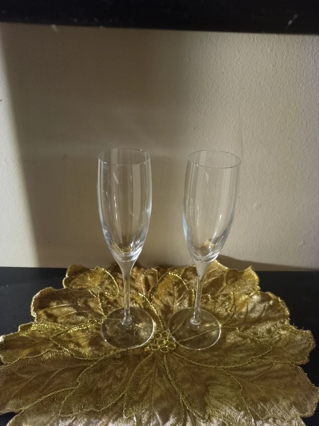 Set of 2 Clear Champagne Flutes and one small flower rug