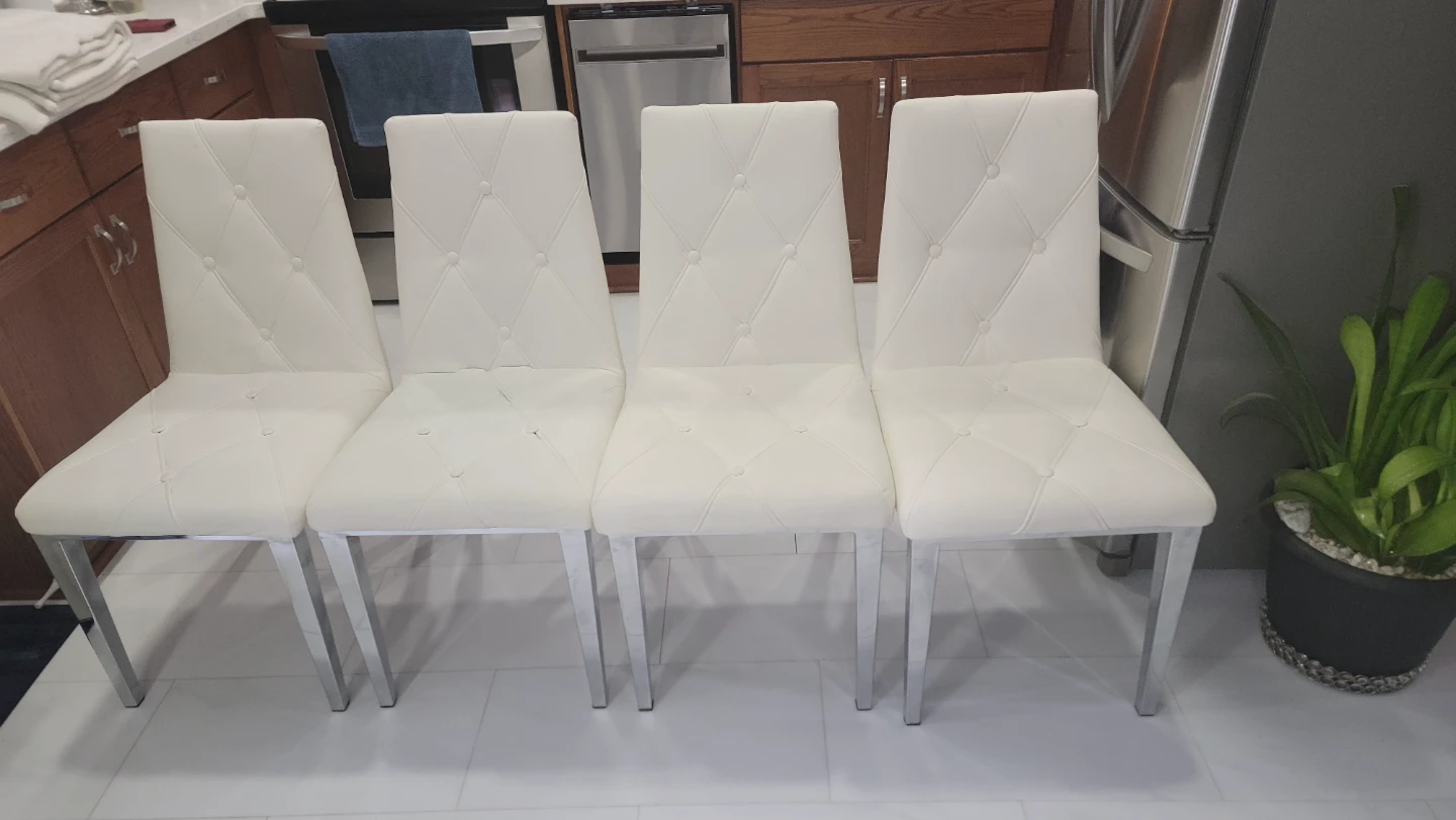 White leather chairs chrome legs