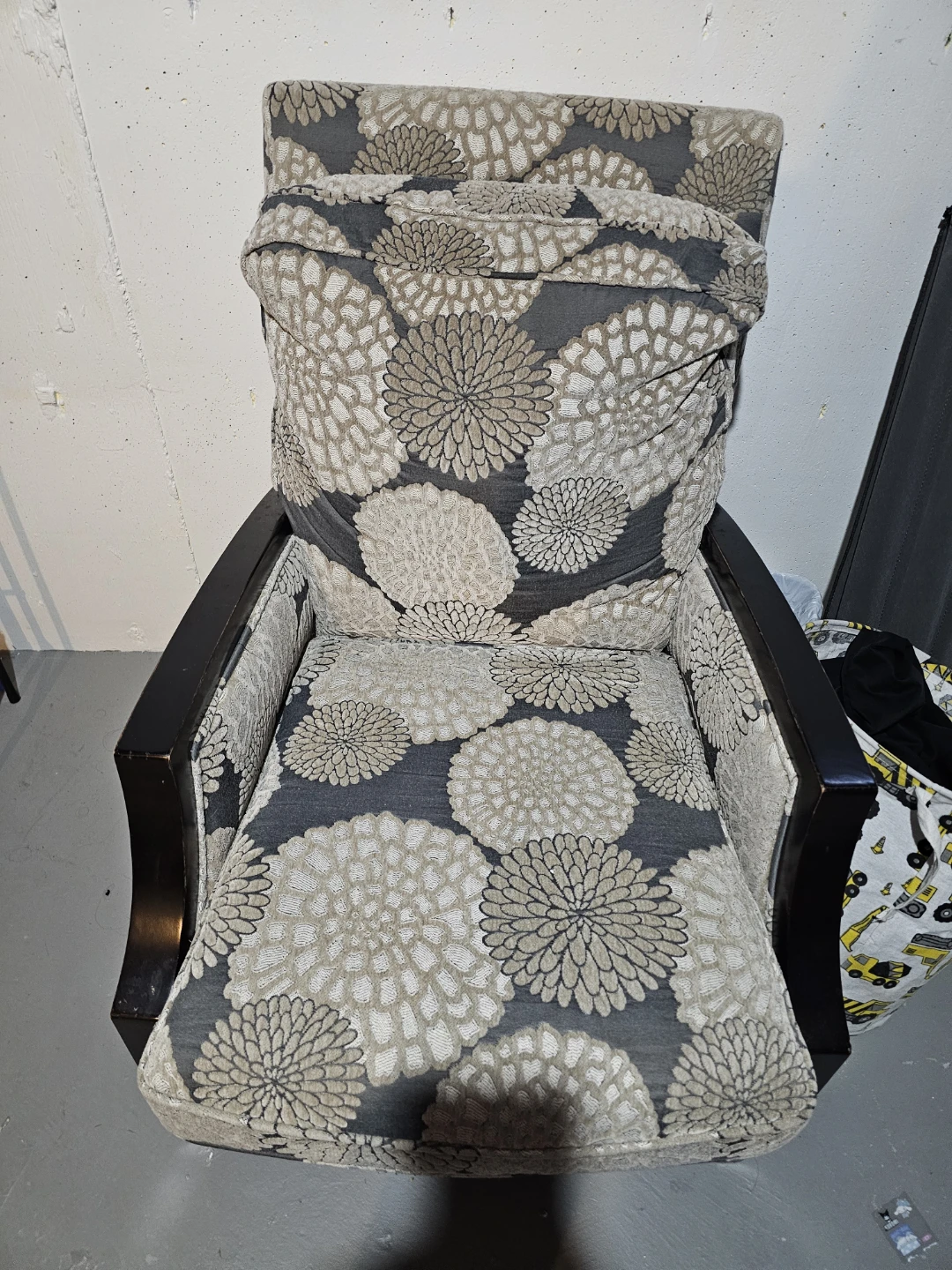 Floral accent chair with dark wood frame