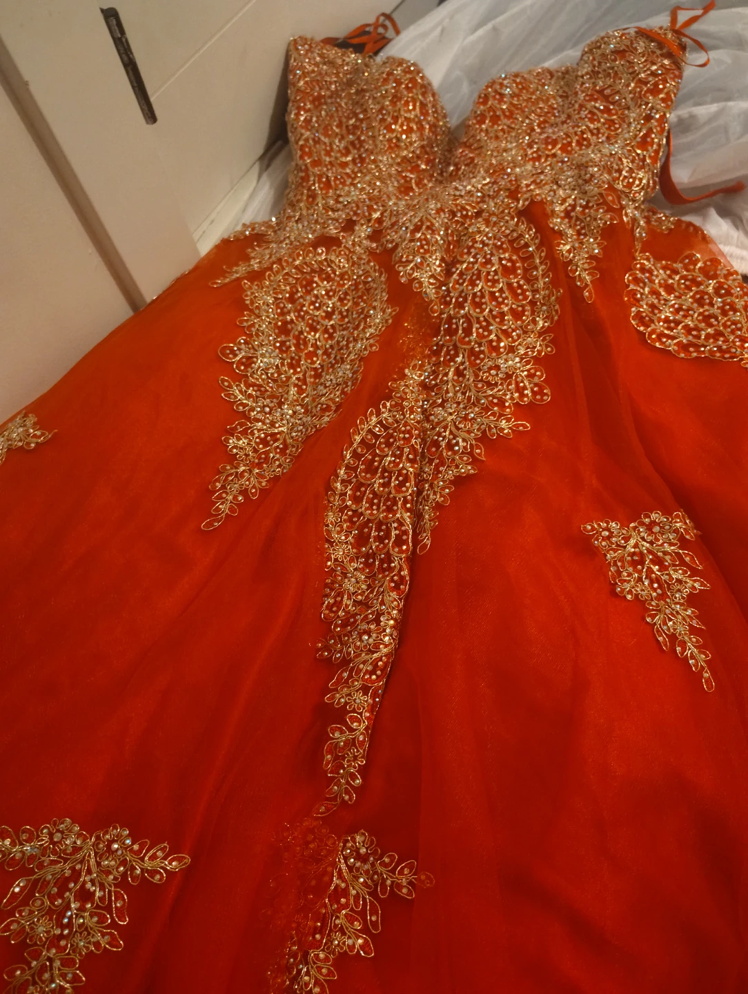 Orange lace and tulle ball gown