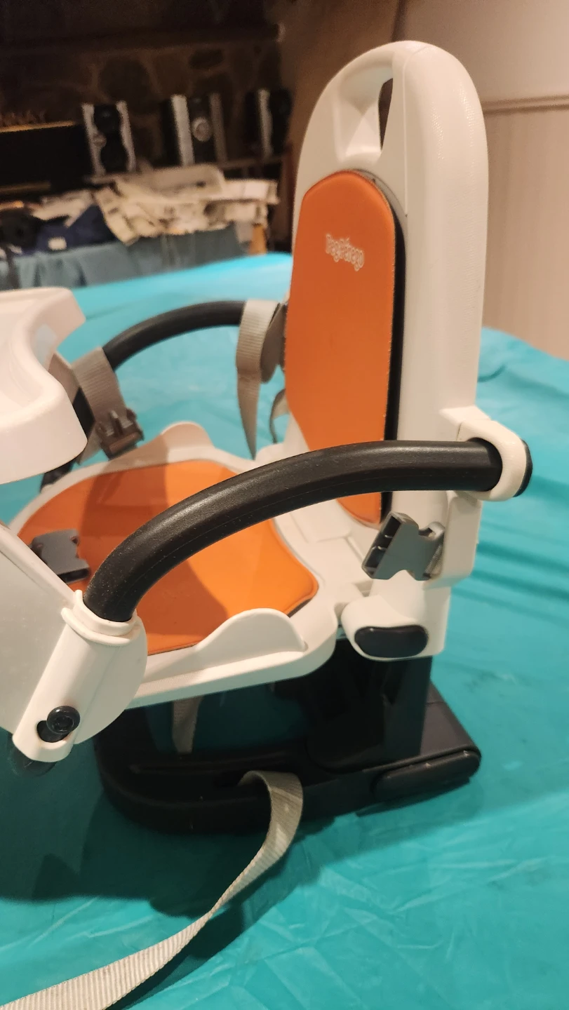 Peg Perego booster seat in orange and white
