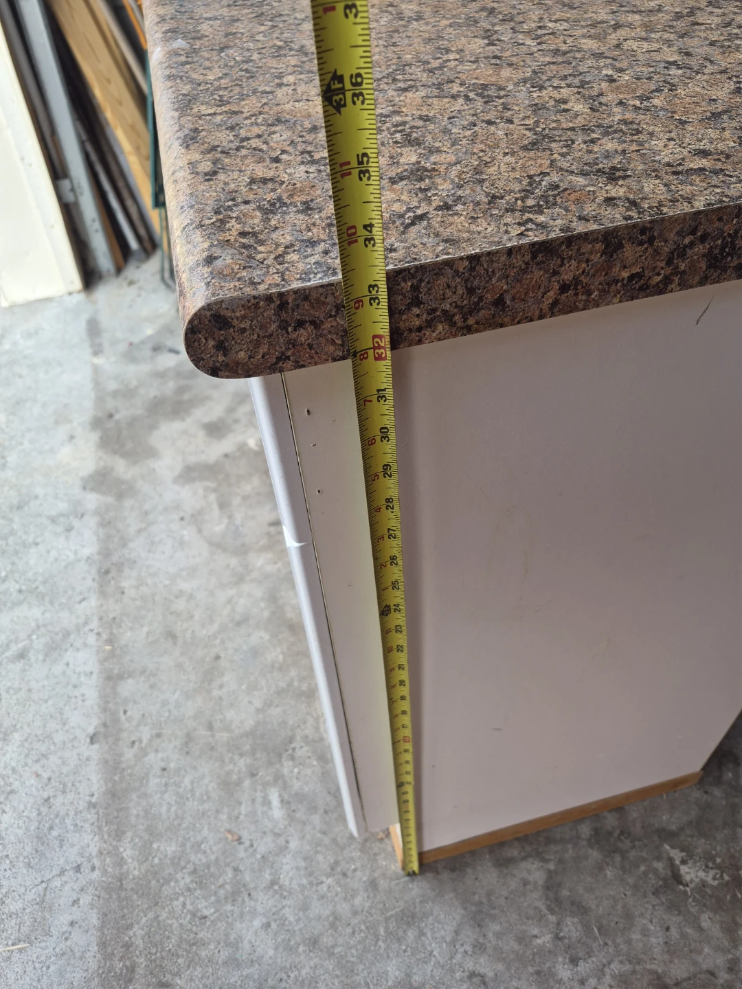White cabinet with granite-look countertop - photo 5