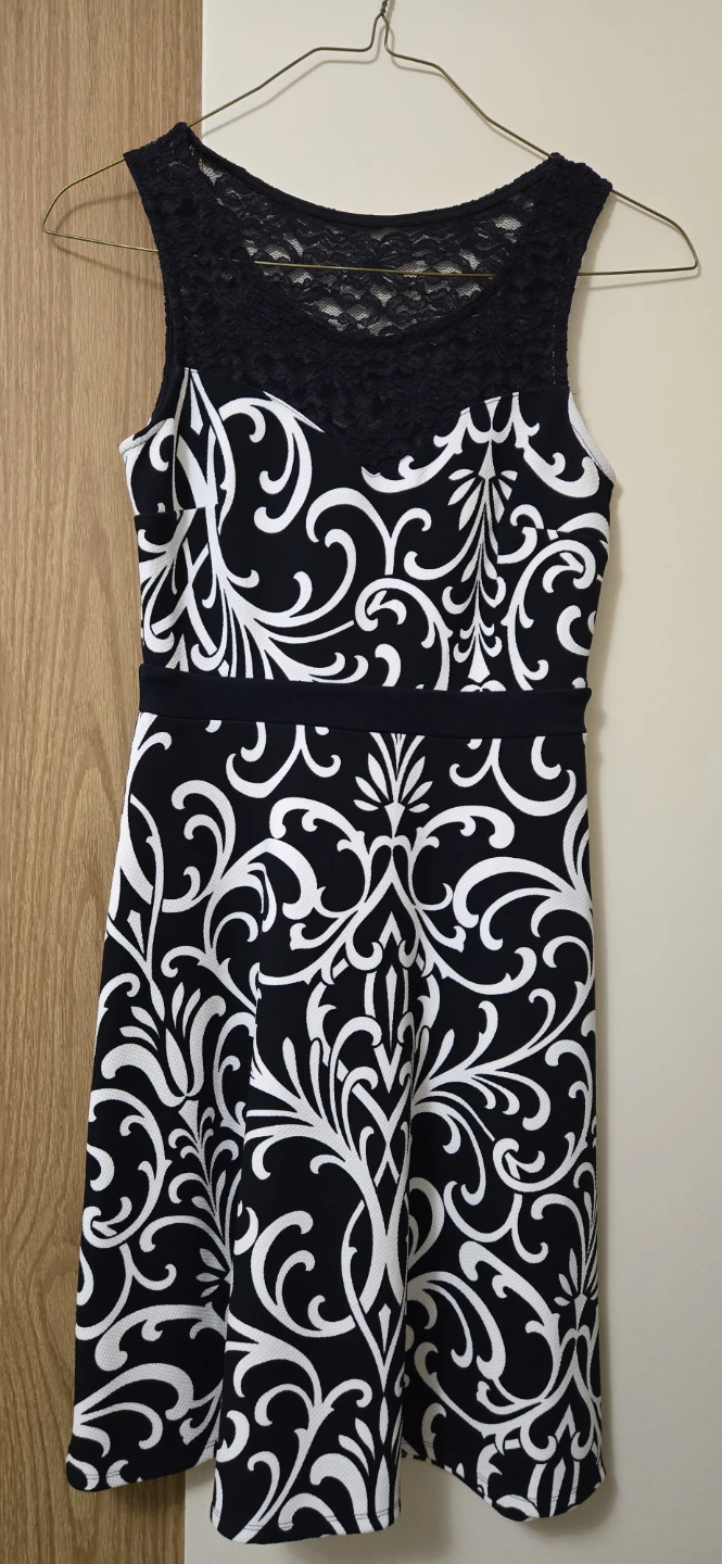 Blue  and white patterned dress with lace neckline