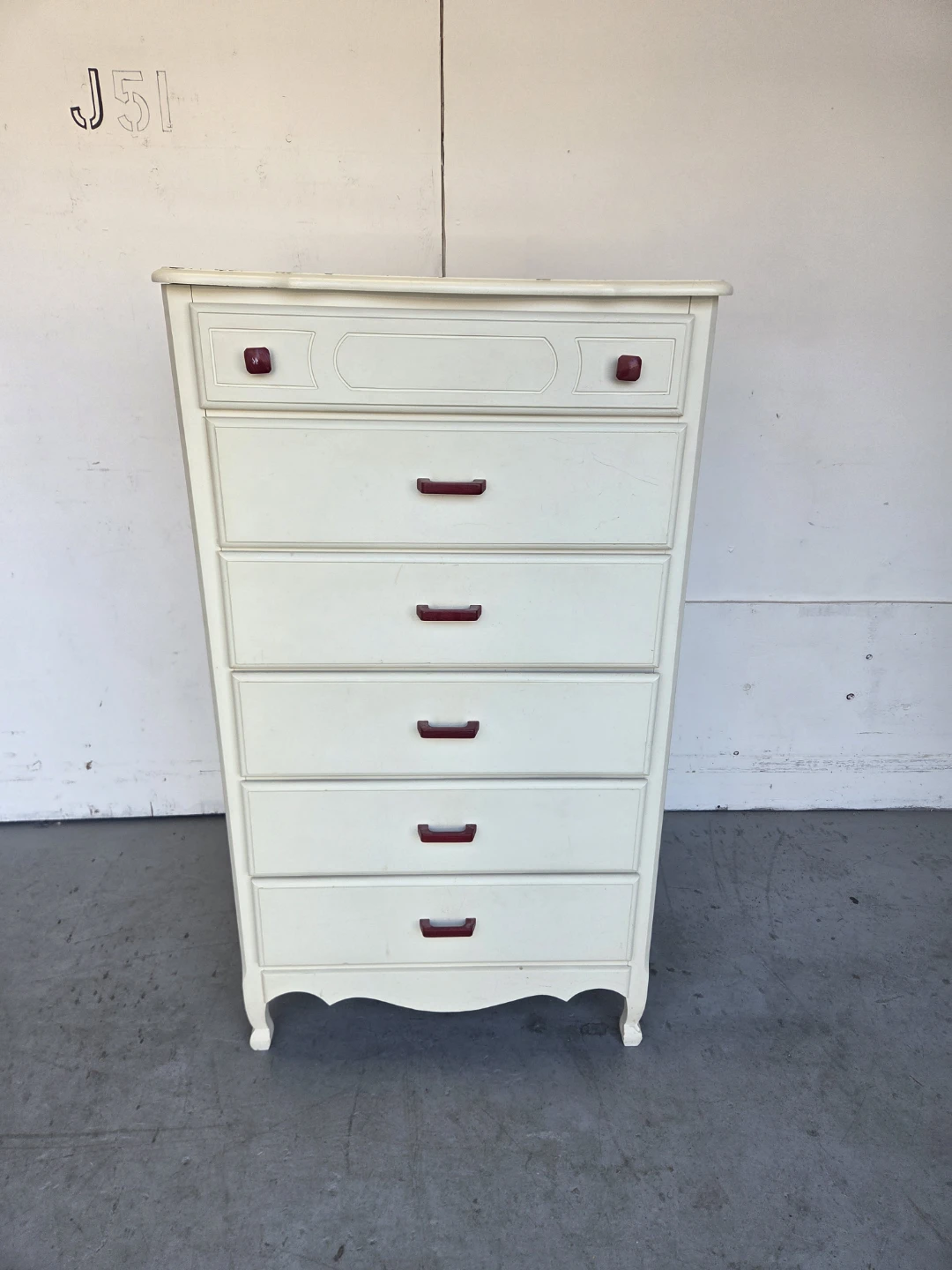 Cream Coloured Tall Dresser with Red Handles